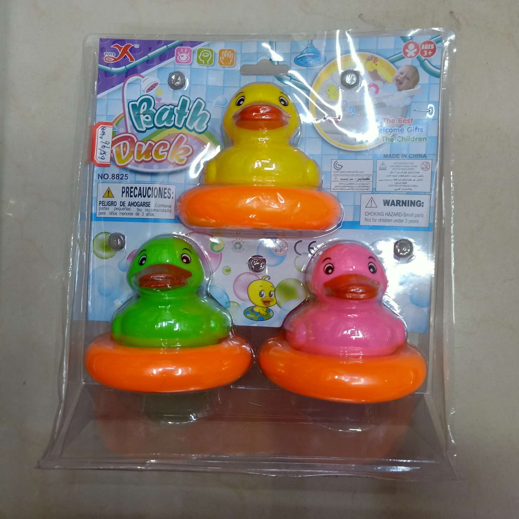 Children swim in the bath and play with water toy ducks thumbnail