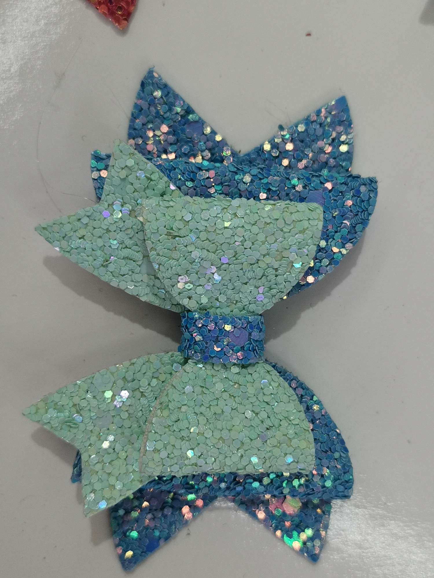 Ceramic two-color four-layer bow Item Picture