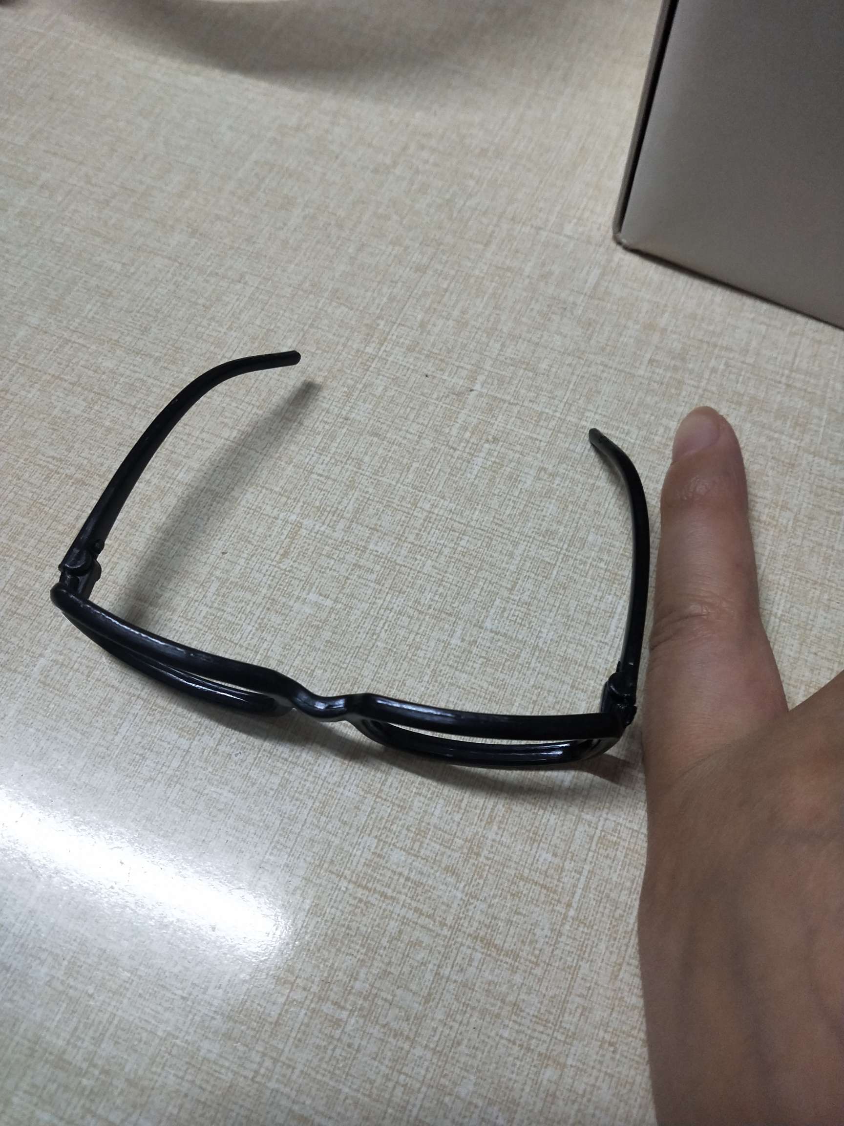 陶瓷娃娃装饰眼镜框 卡通玩具眼镜框 无镜片 脑白金娃娃眼镜框 玩具眼镜 小眼镜 黑色 一次性眼镜产品图