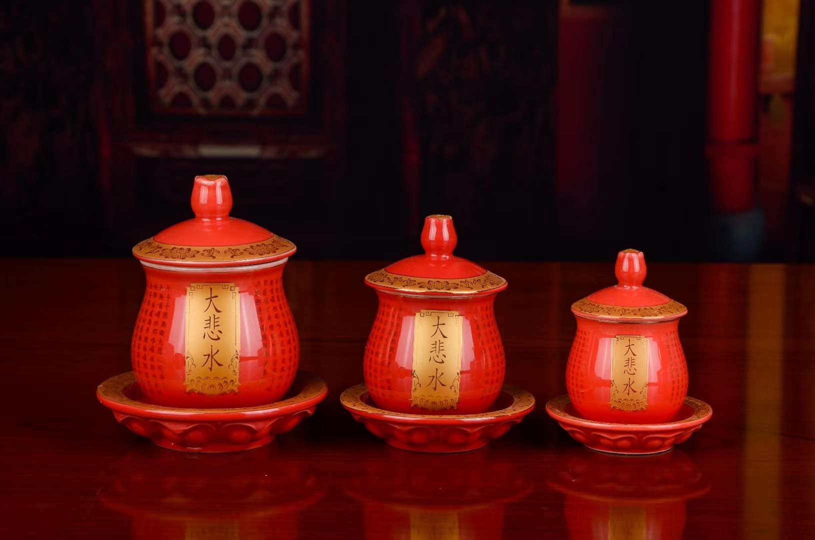 A new red Great Compassion water cup, a auspicious Buddhist ornament