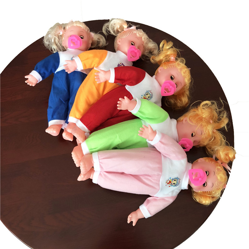 A small pacifier with a rubber cap, a plush toy, a plush doll with a soft rubber cap