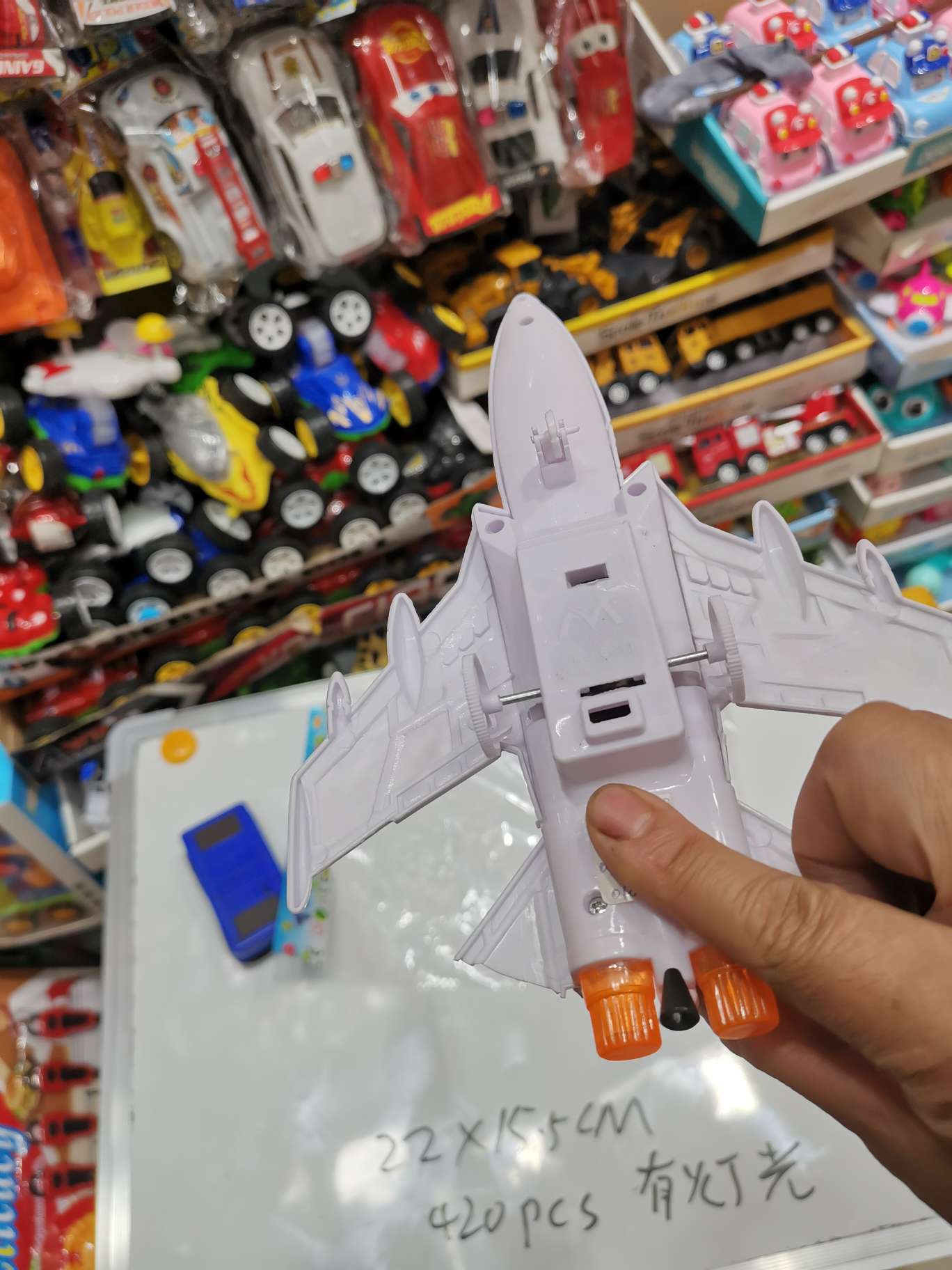 A lighted aircraft with a string Item Picture