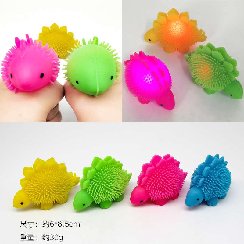 Amazon Hot surface Glowing Furry ball TPR soft rubber elastic dinosaur Knead happy toy decompression vent ball venting glowing furry dinosaur