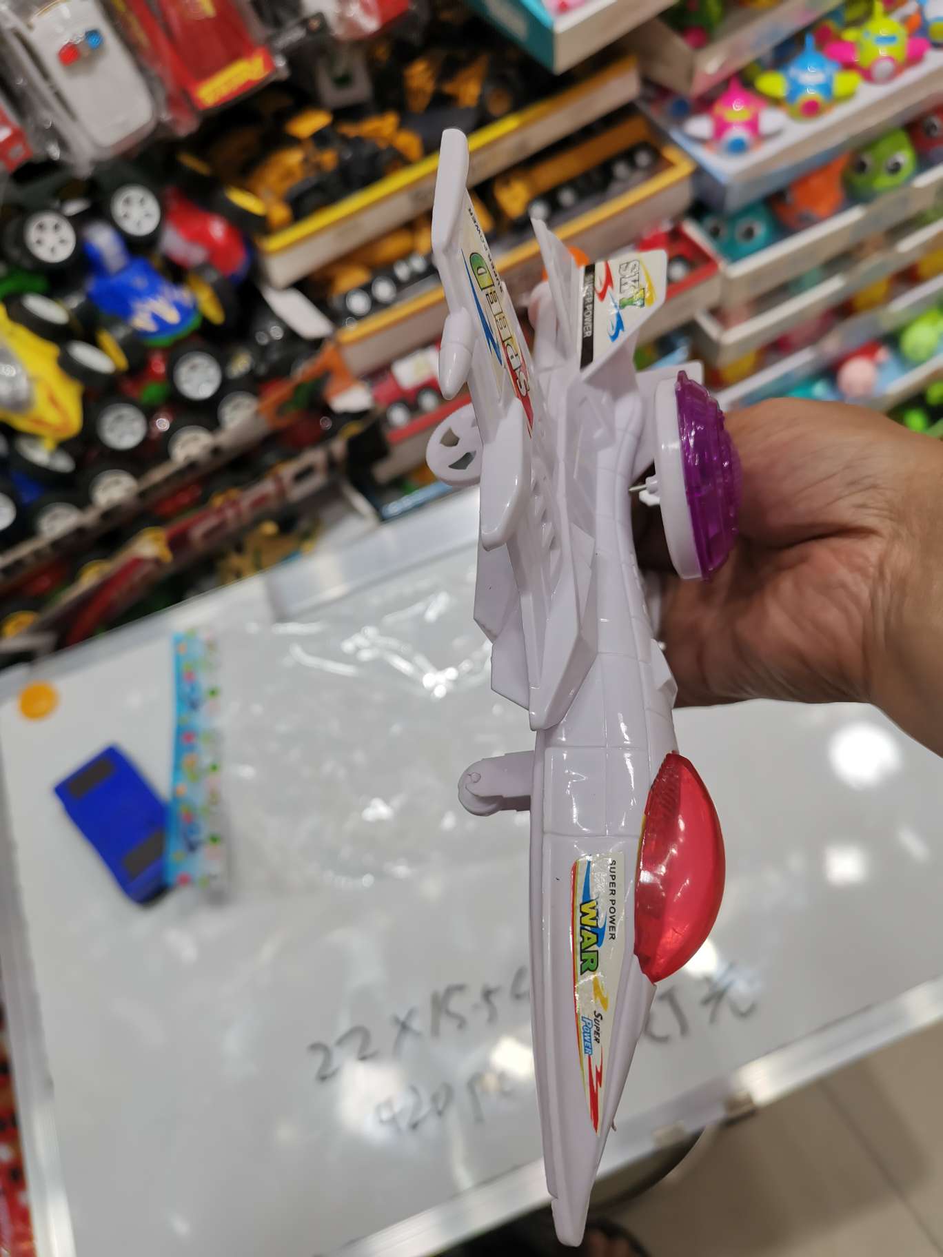 A lighted aircraft with a string undefined