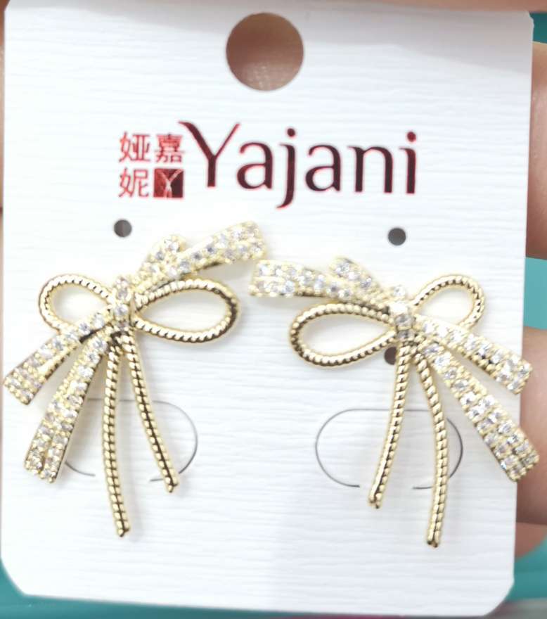 Latest bow inlaid stone allergy - proof earring