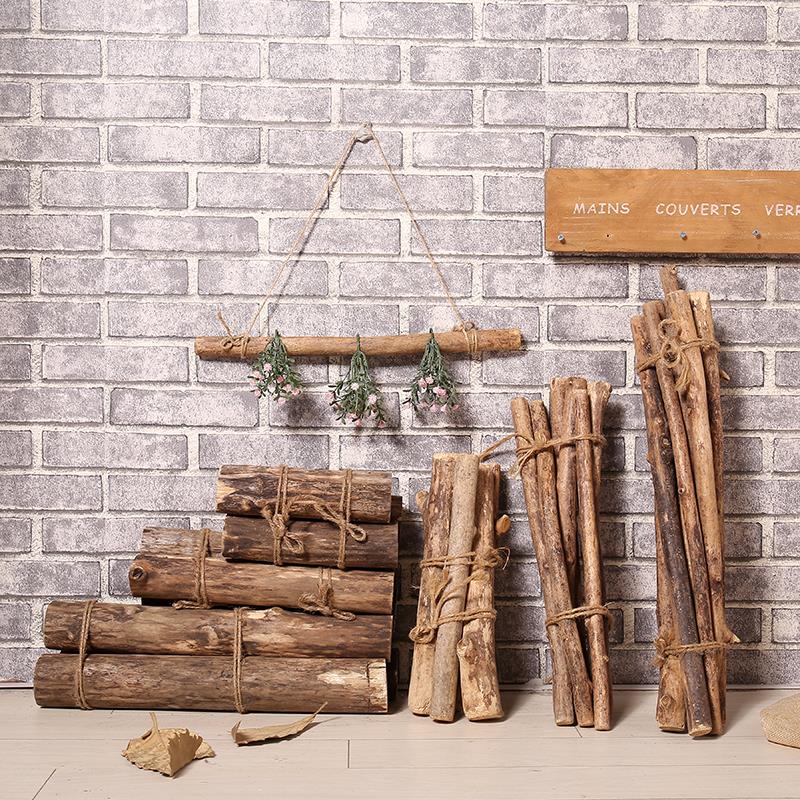 Natural leatherless old poplar wood bundles are used to decorate window displays and shoot props