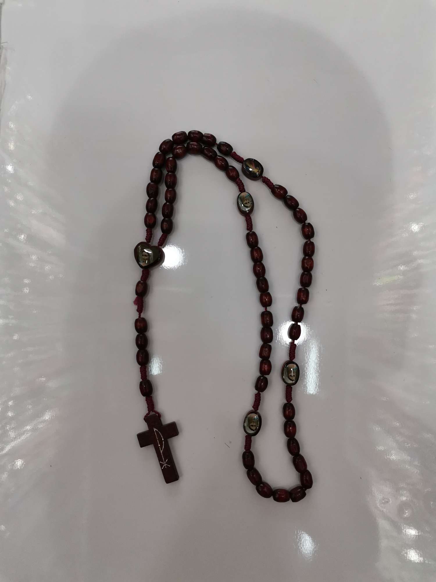 Collar de la cruz del goteo