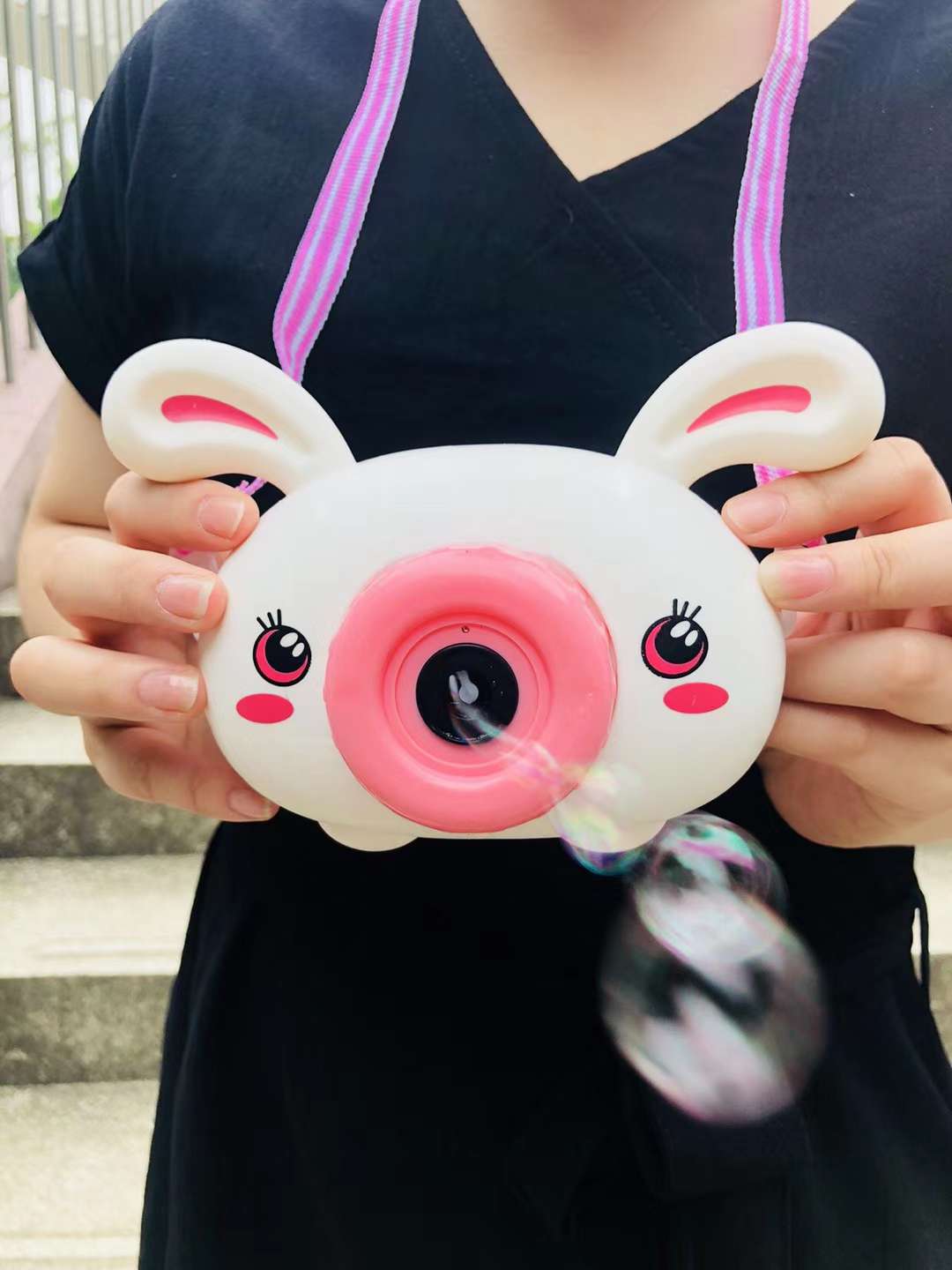 The popular cute rabbit camera bubble creative toy Application Scenario