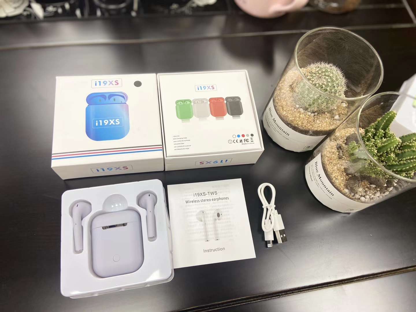 i19xs蓝牙耳机白底实物图