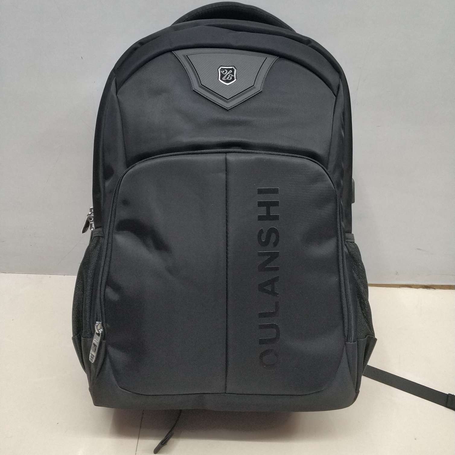 欧兰仕商务多功能16寸电脑背包男女休闲旅行充电大容量双肩包