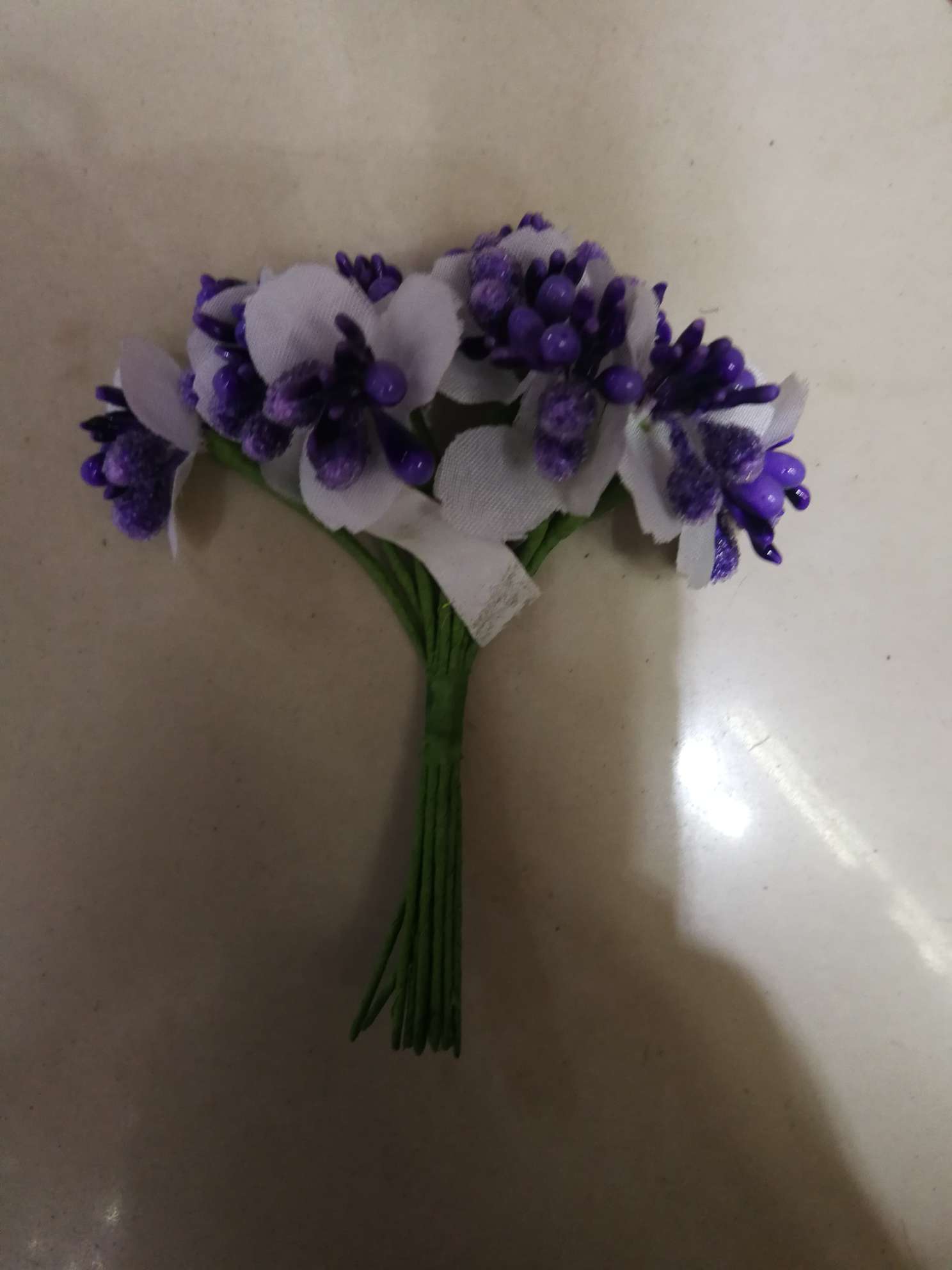 Flower receptacle face beads
