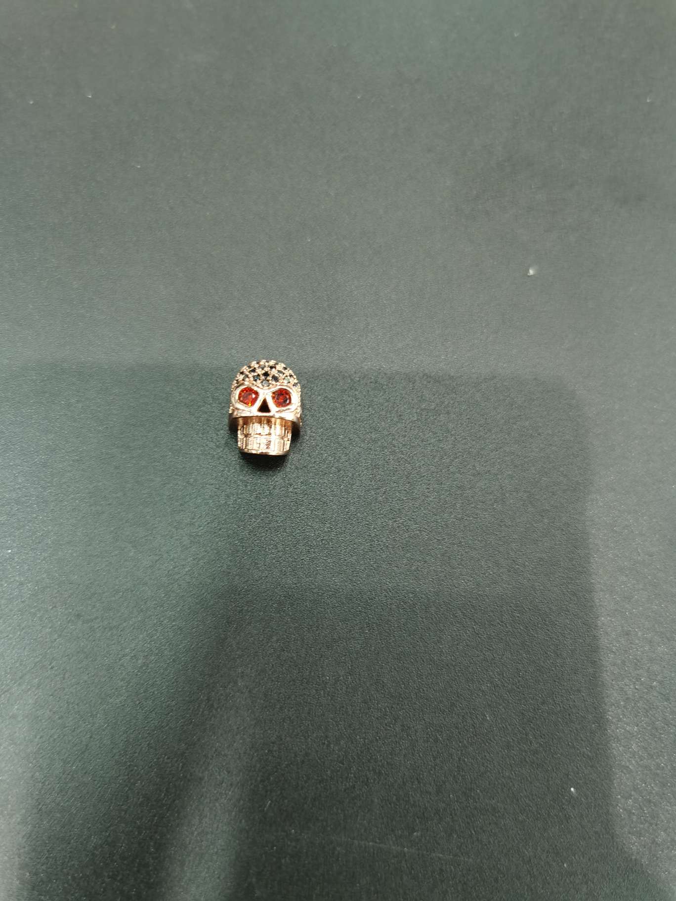 铜微镶骷颅头配件图