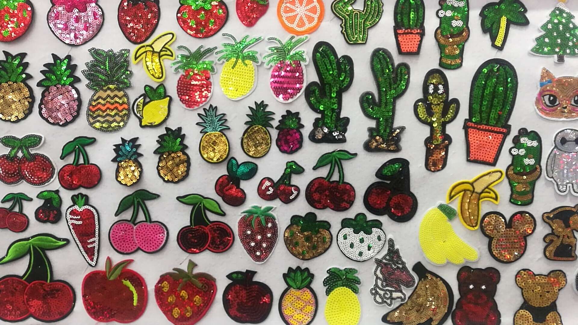 Hot melt adhesive sequin sequin embroidery patchwork for clothing, bags, cartoon sequin embroidery patchwork Application Scenario