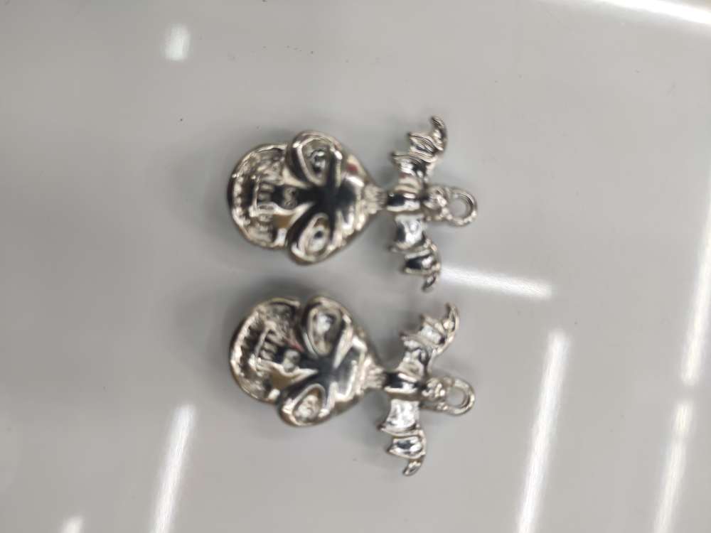 The H792 skull is approximately 32MM in length, 23MM in width, 8MM in thickness, and has a hole diameter of 2MM Specification image