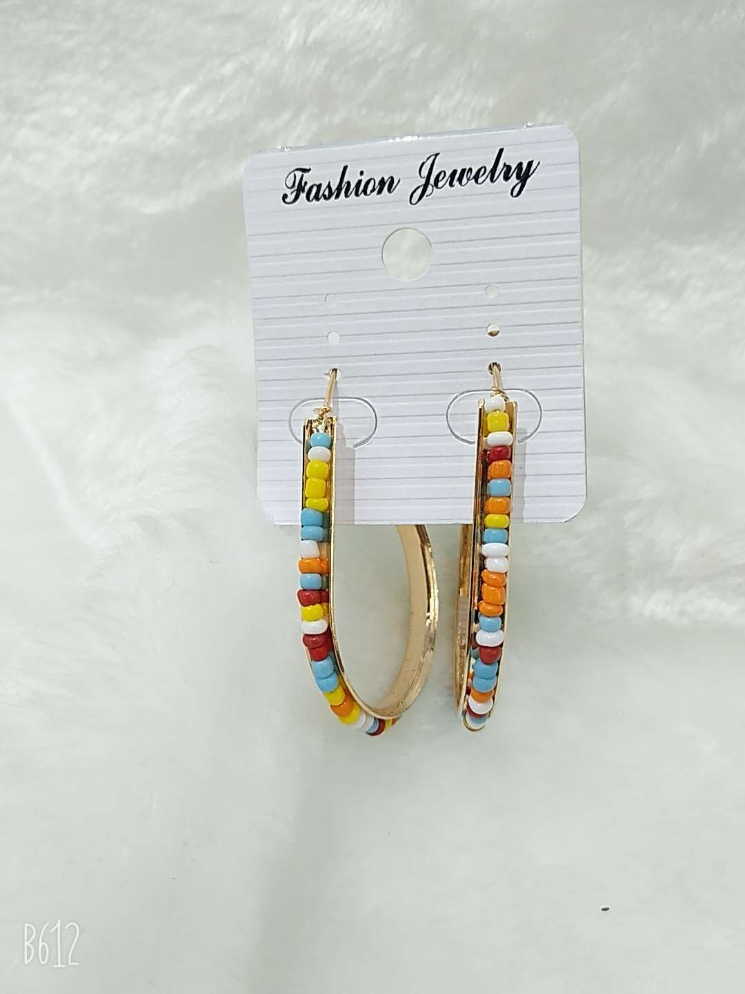 Drop - shaped rice pearl earrings