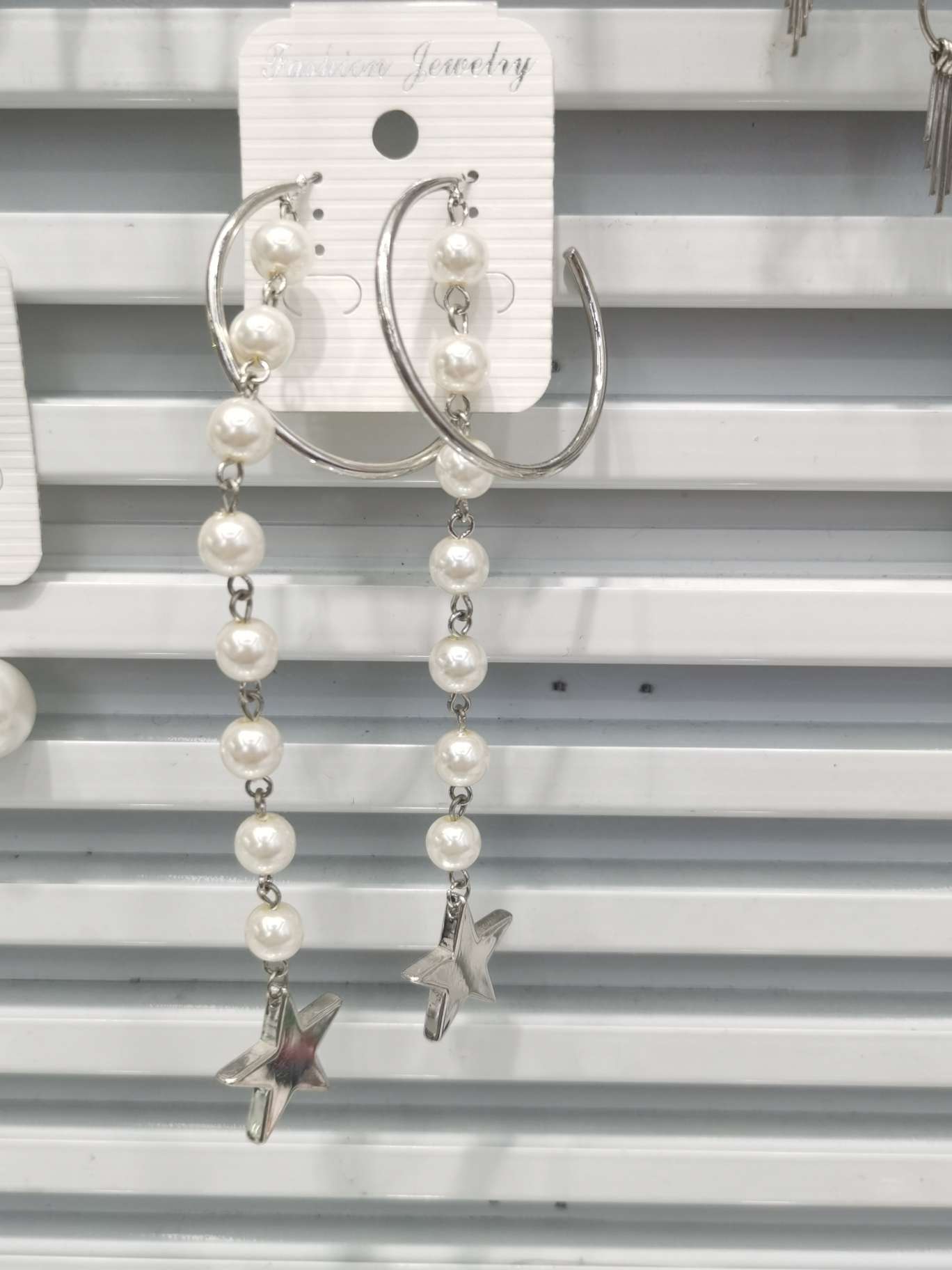 Long pearl earrings