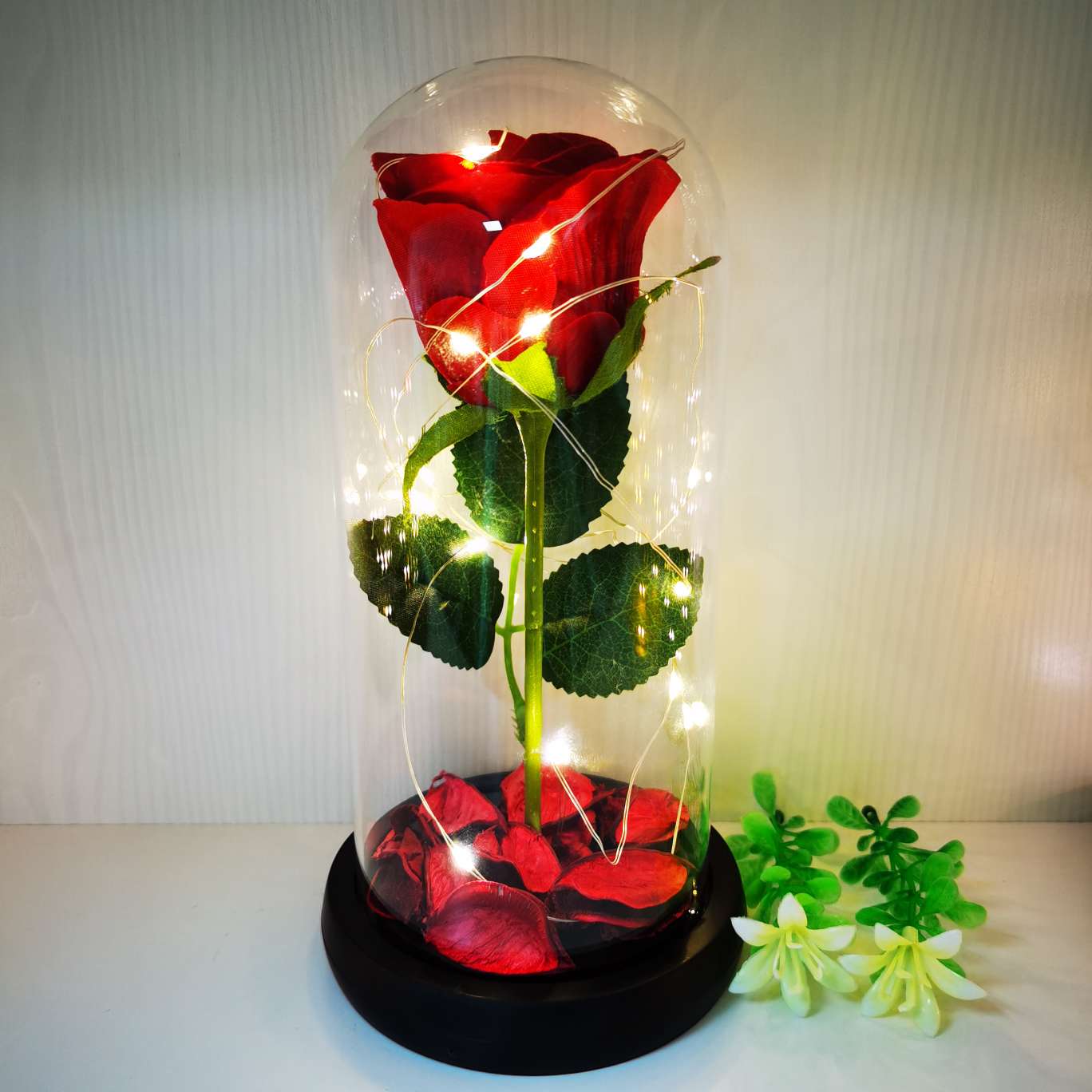 A silk flower ornament with a glass cover Specification image