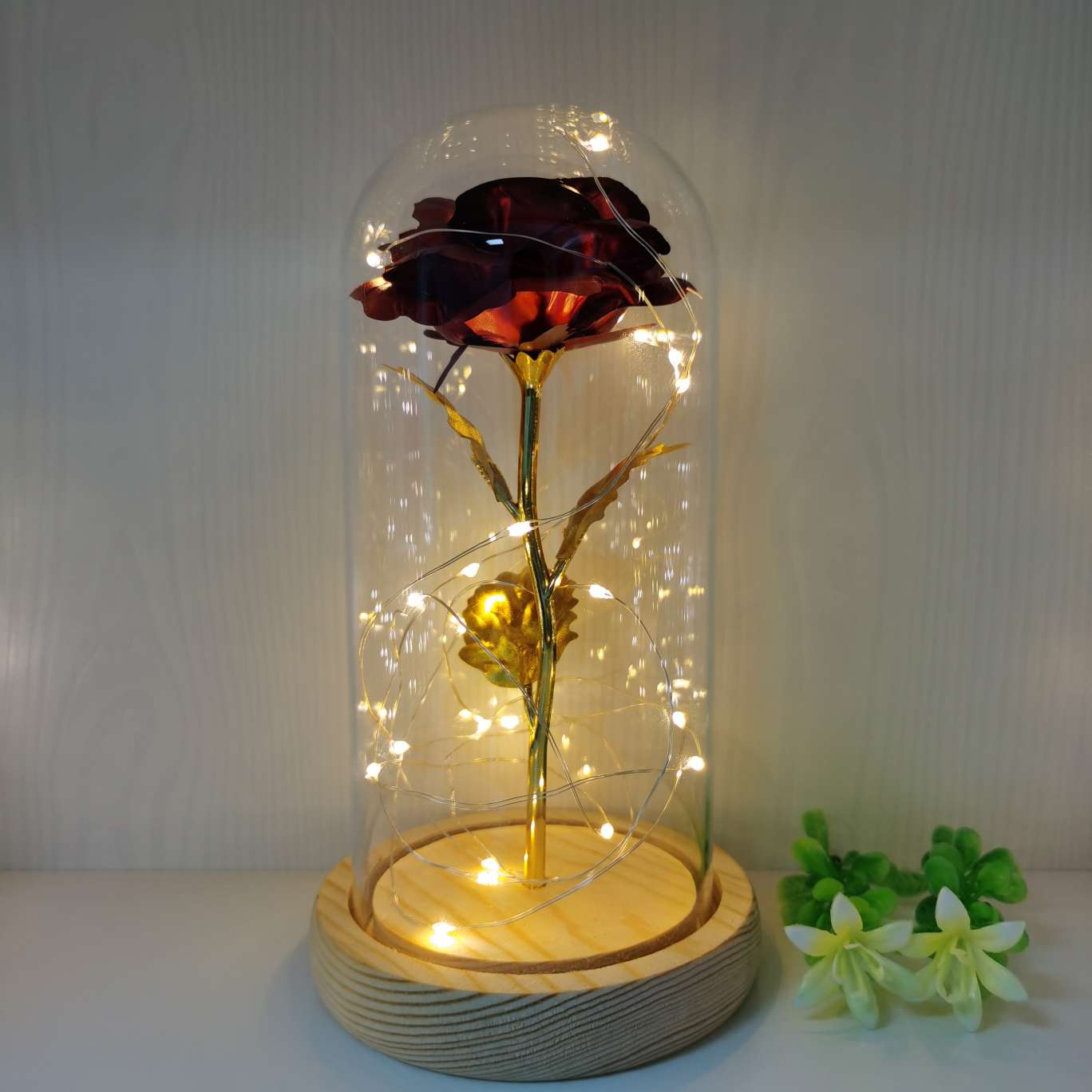 Gold foil rose with a glass cover ornament details Picture