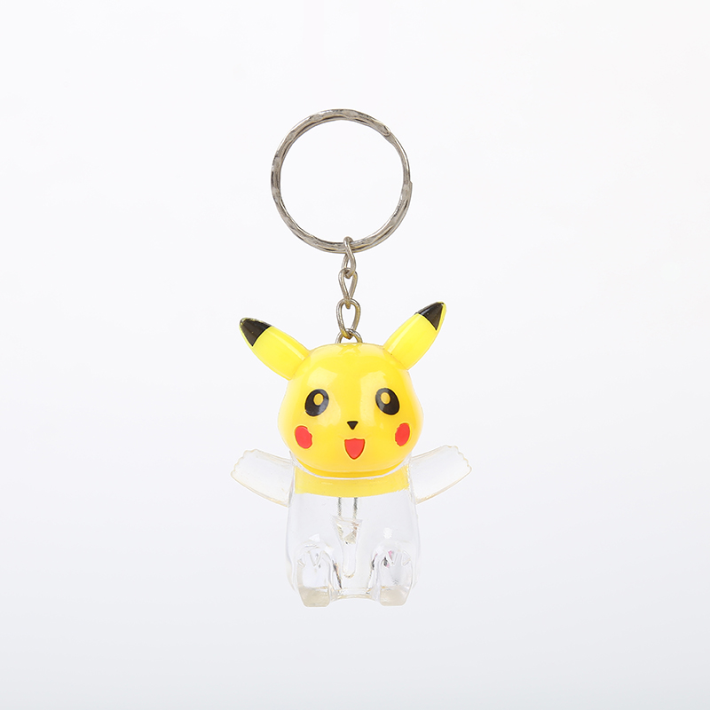 夜市地摊爆款电子挂件闪光皮卡丘 儿童发光玩具白底实物图