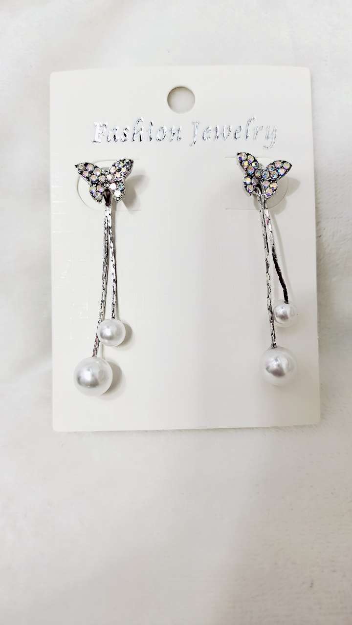 Super fairy bow earrings Female Korean temperament pearl earrings personality slimming earrings stud earrings