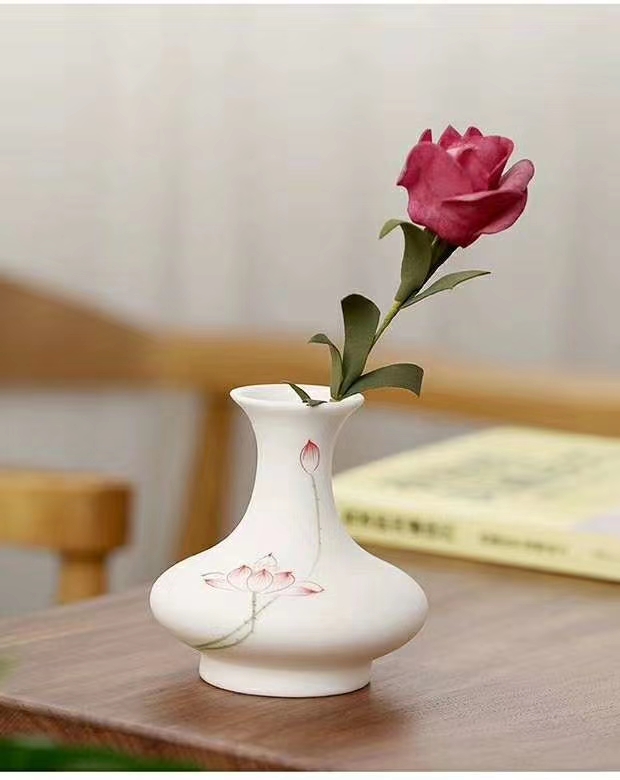 قارورة زهور صغيرة من شحم الخروف