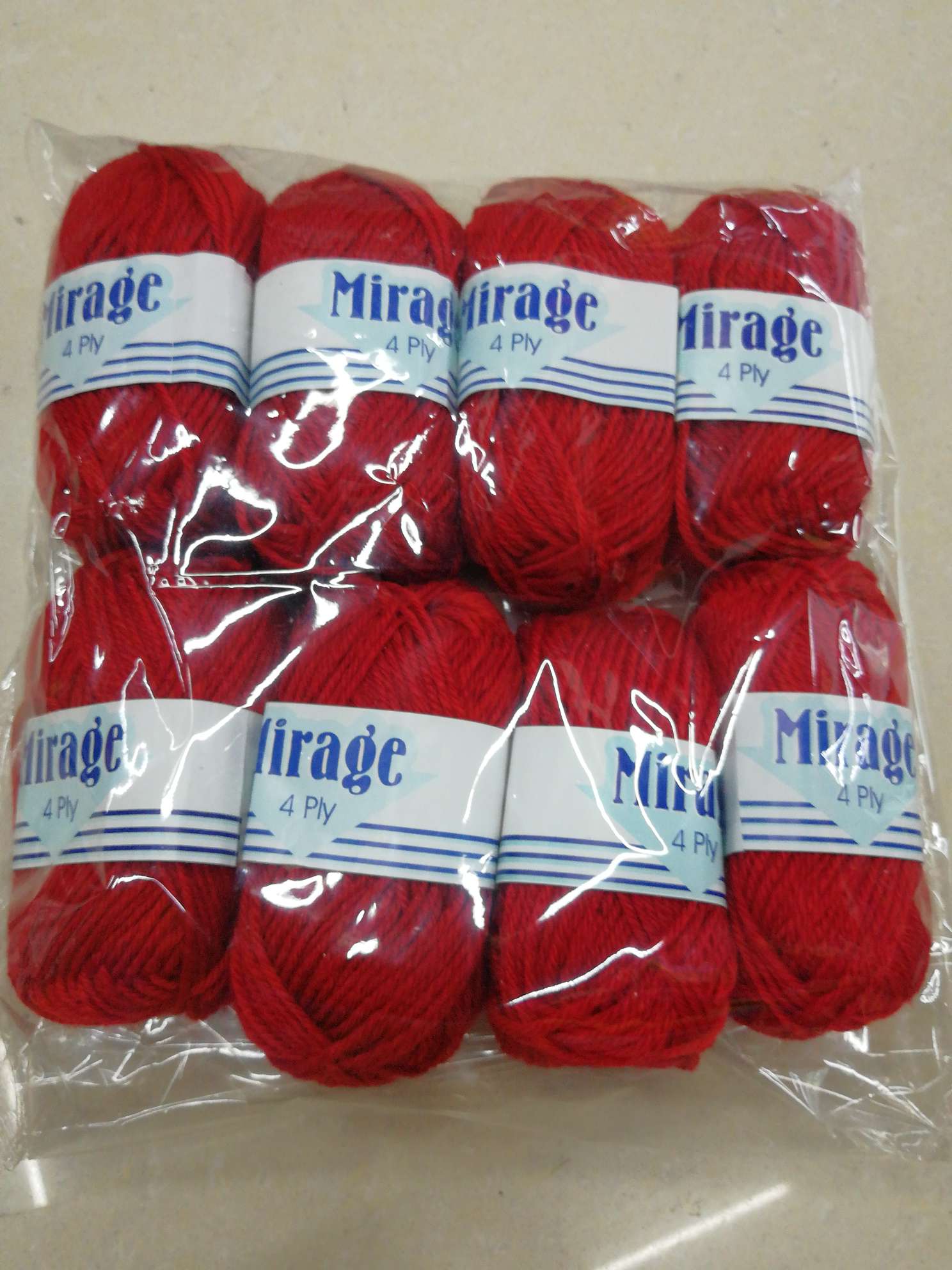 Four strands of red wool