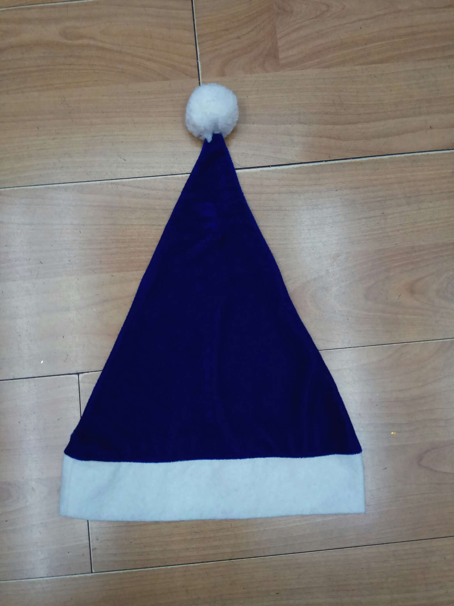 A blue gold-threaded velvet hat