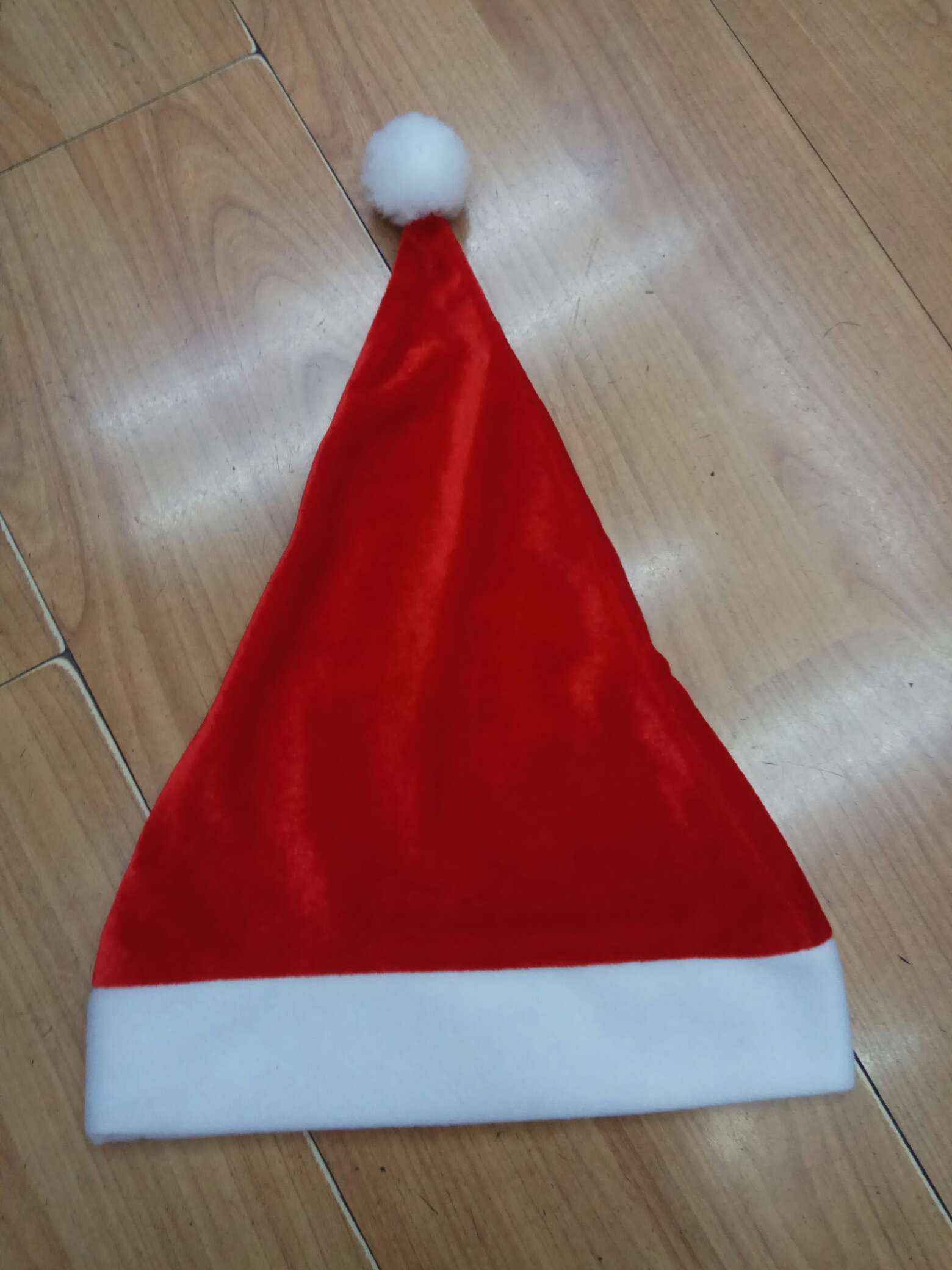 A golden silk fleece brim Christmas hat