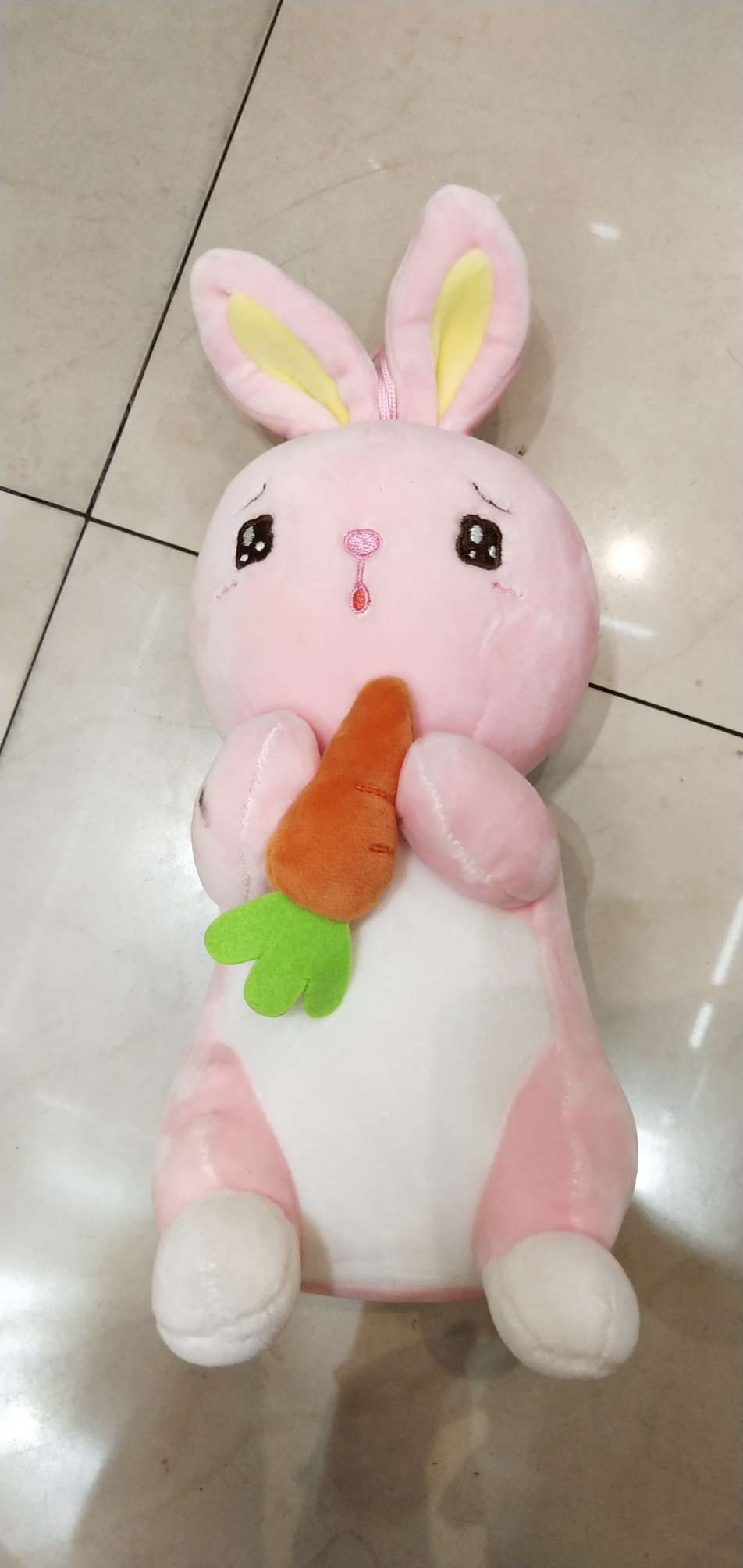 Wholesale of stuffed radish rabbit plush toys and claw machine dolls details Picture