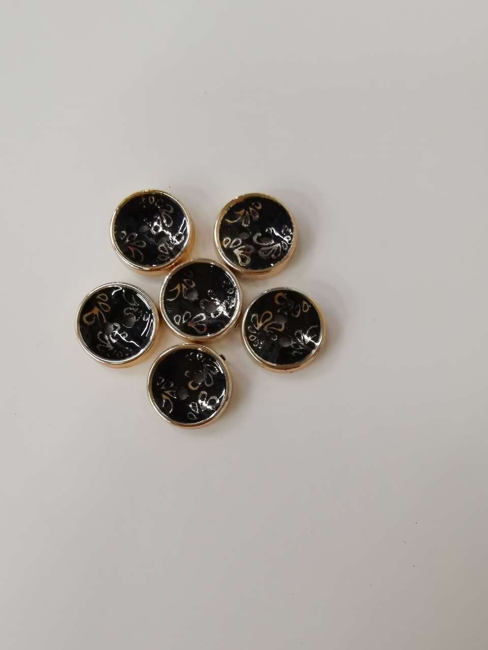 Shirt button