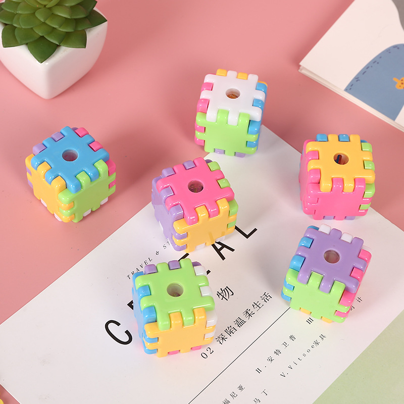 Creative cartoon plastic building block puzzles, children's pencil sharpeners, and small stationery gifts for students undefined