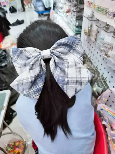 Influencer Plaid Control Bow