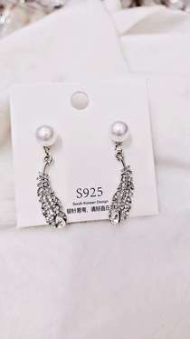 Drewna Hotel iu earrings feather Zhang Full moon Li Zhien super Xian advanced sense S925 silver needle earrings female