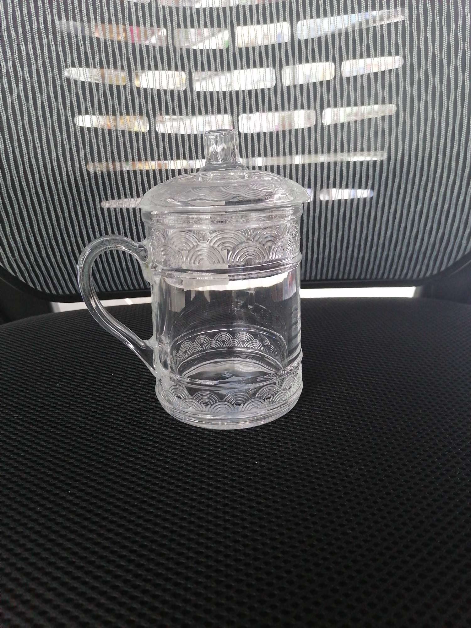 Covered glass teacup