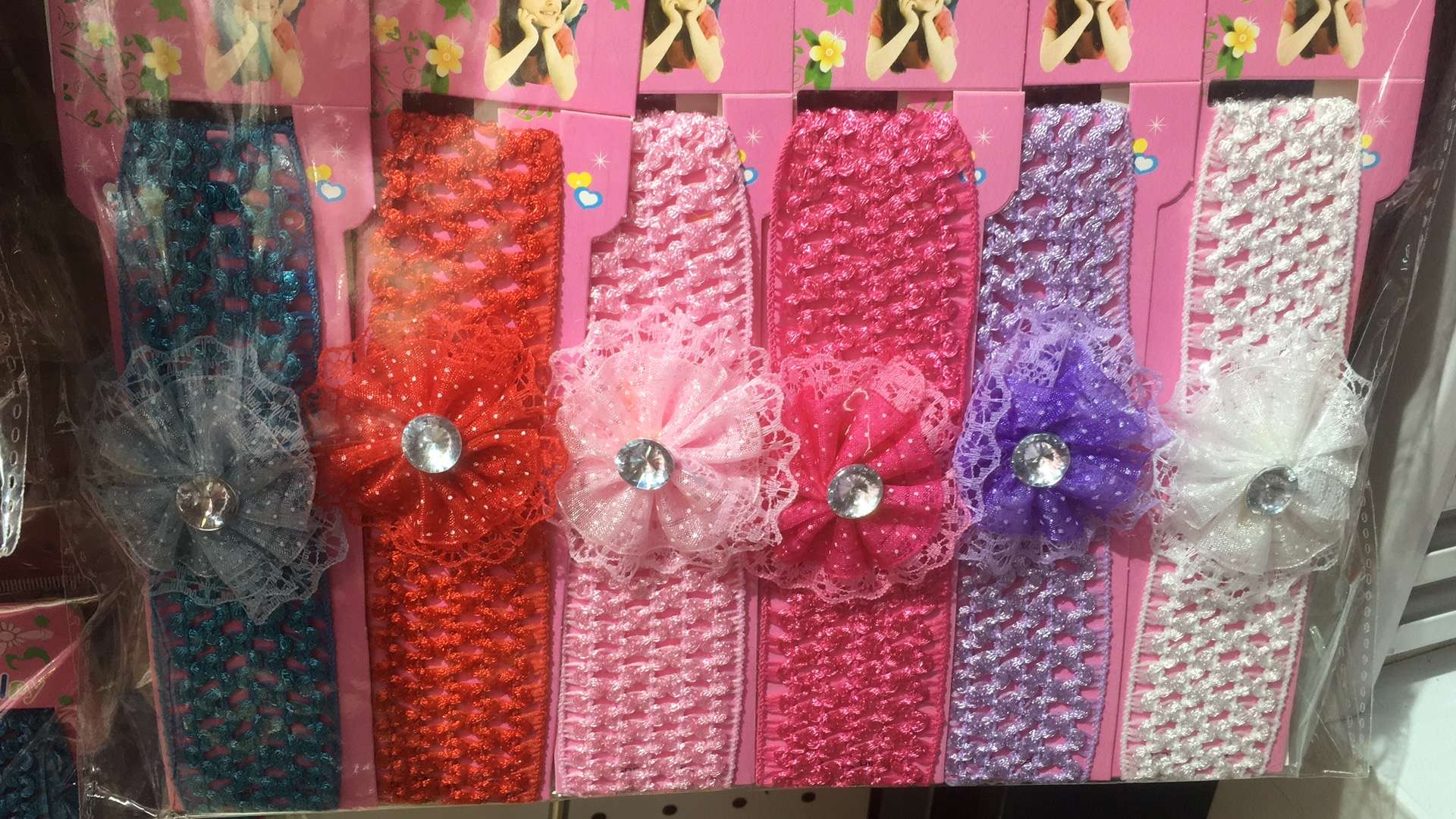 Small head wearing colorful cloth dot round thumbnail