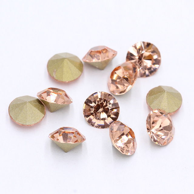 Champagne pointed-bottom rhinestone nail drill