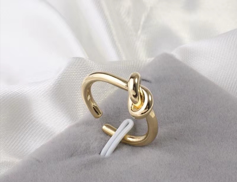 Gold plated ring with copper face