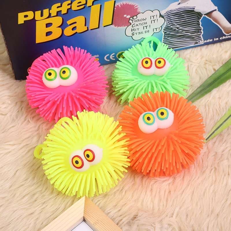 儿童玩具手捏批发货源充气闪光带电子凸眼雪花毛毛球产品图