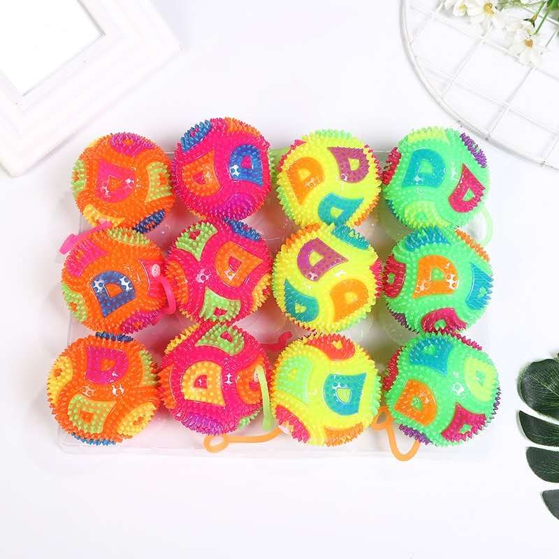 地摊货源闪光发声弹力按摩球贴片钻石球