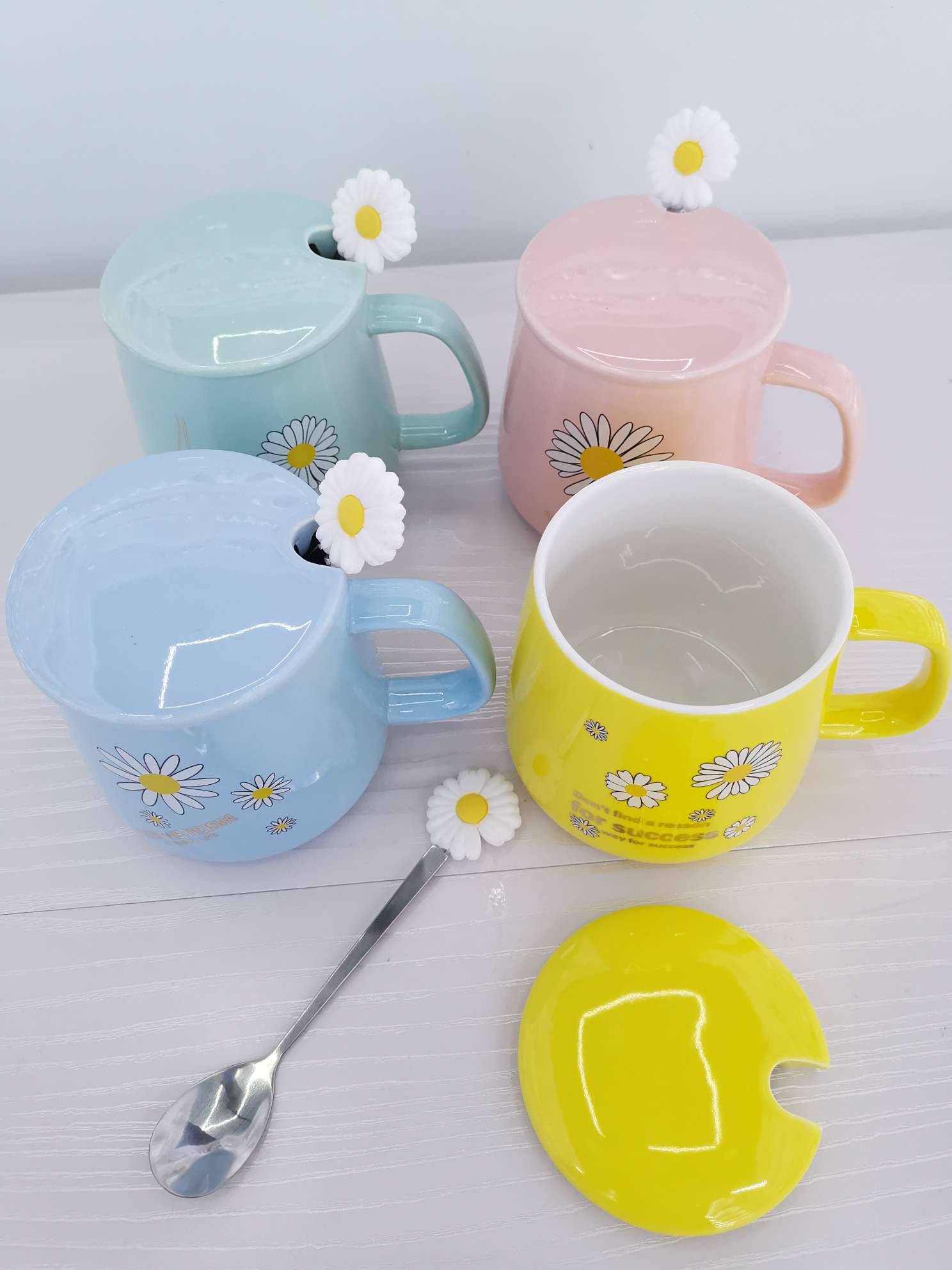 Fresh chrysanthemum-colored glazed ceramic mugs, coffee cups and water cups