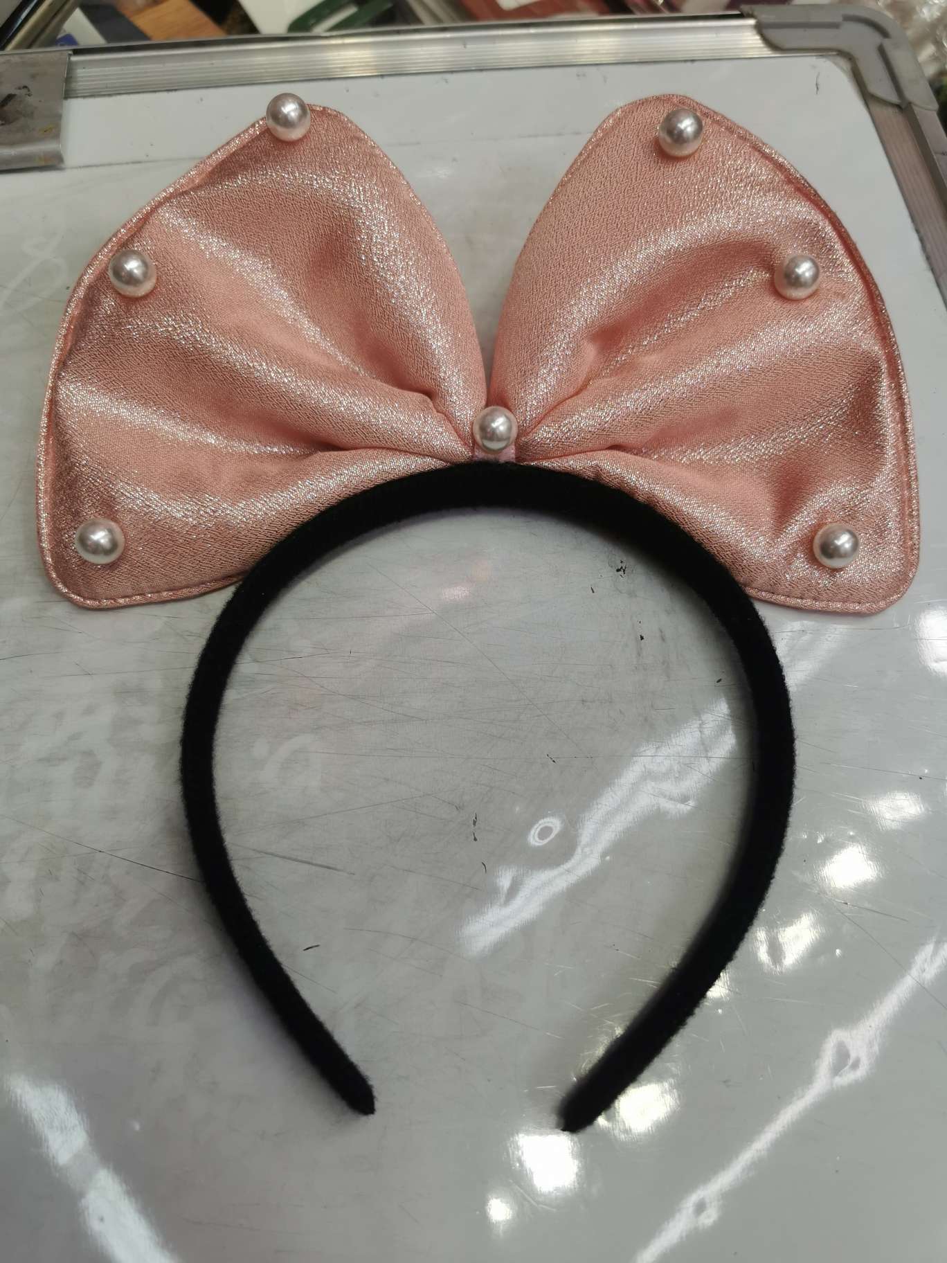 Pink ear studs thumbnail
