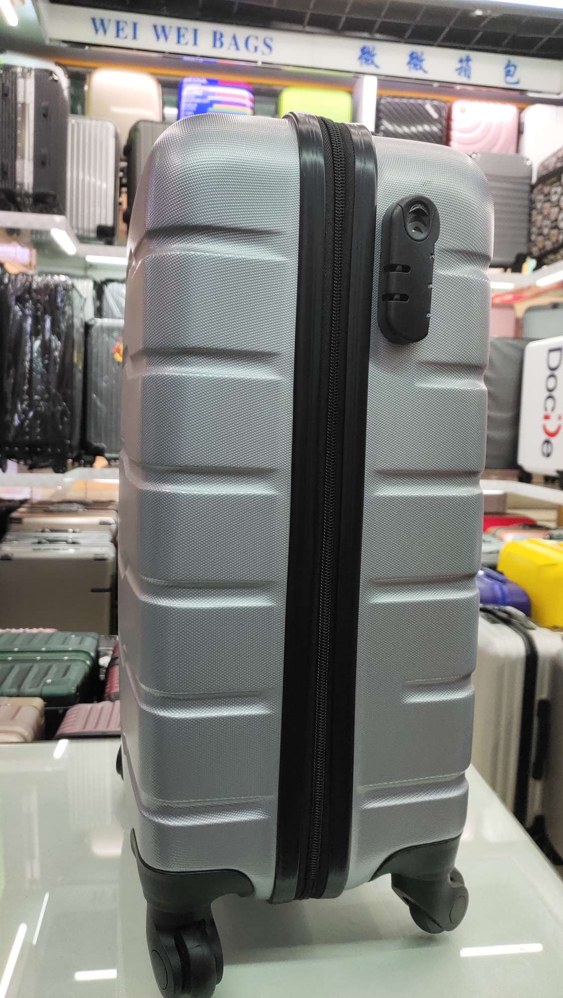 The 20-inch ABS suitcase with a handle is a best-selling suitcase undefined