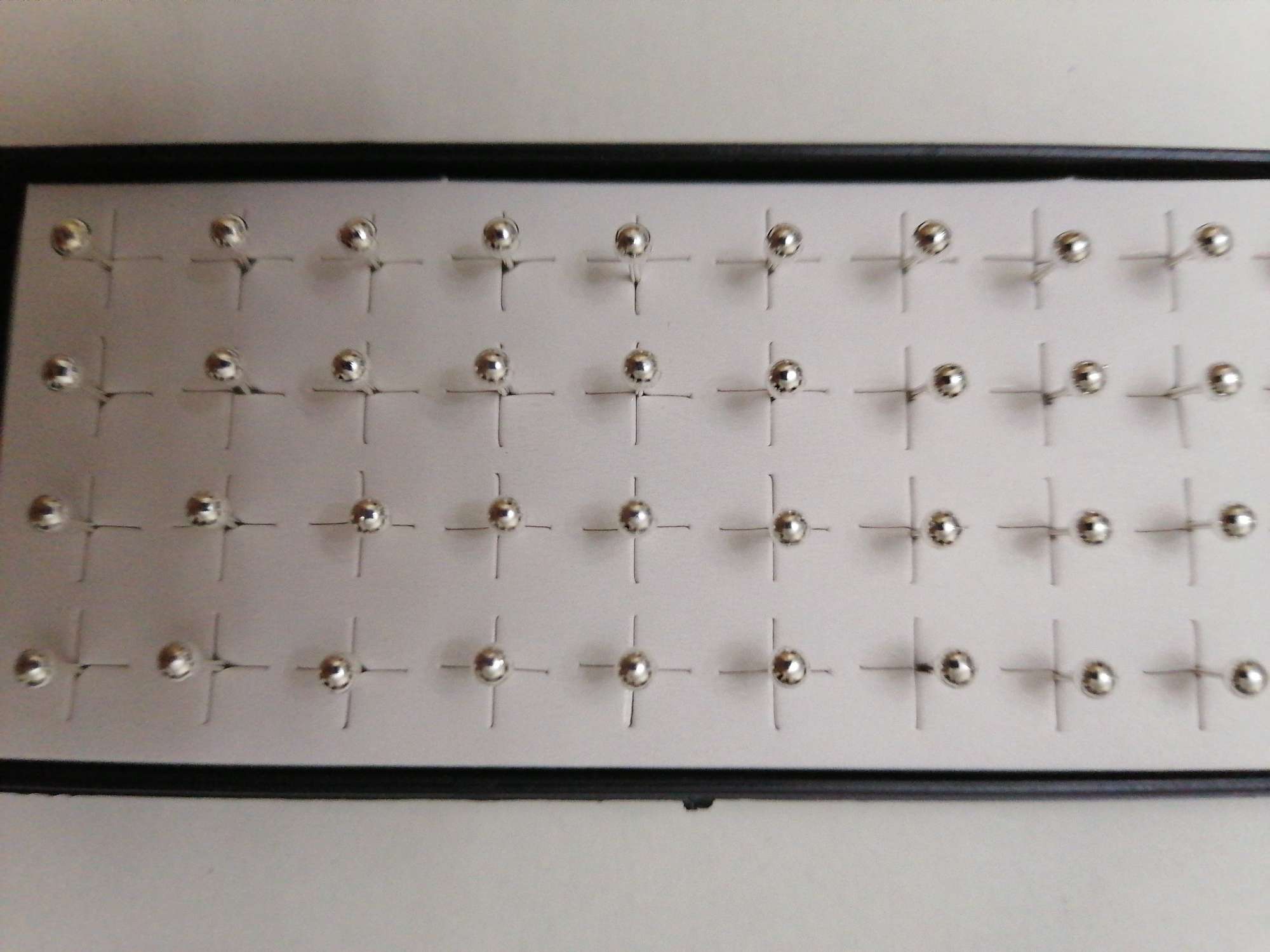 A trumpet in a ball stud thumbnail