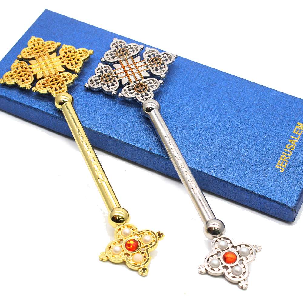 Exports of religious prayer supplies holding crosses have been brisk thumbnail