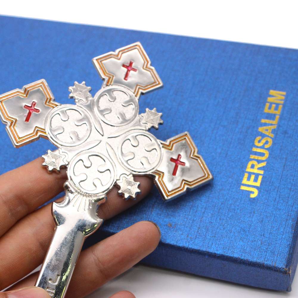 Holding a cross, JERUSALEM, Israeli Catholic religious prayer ceremony items and gifts details Picture