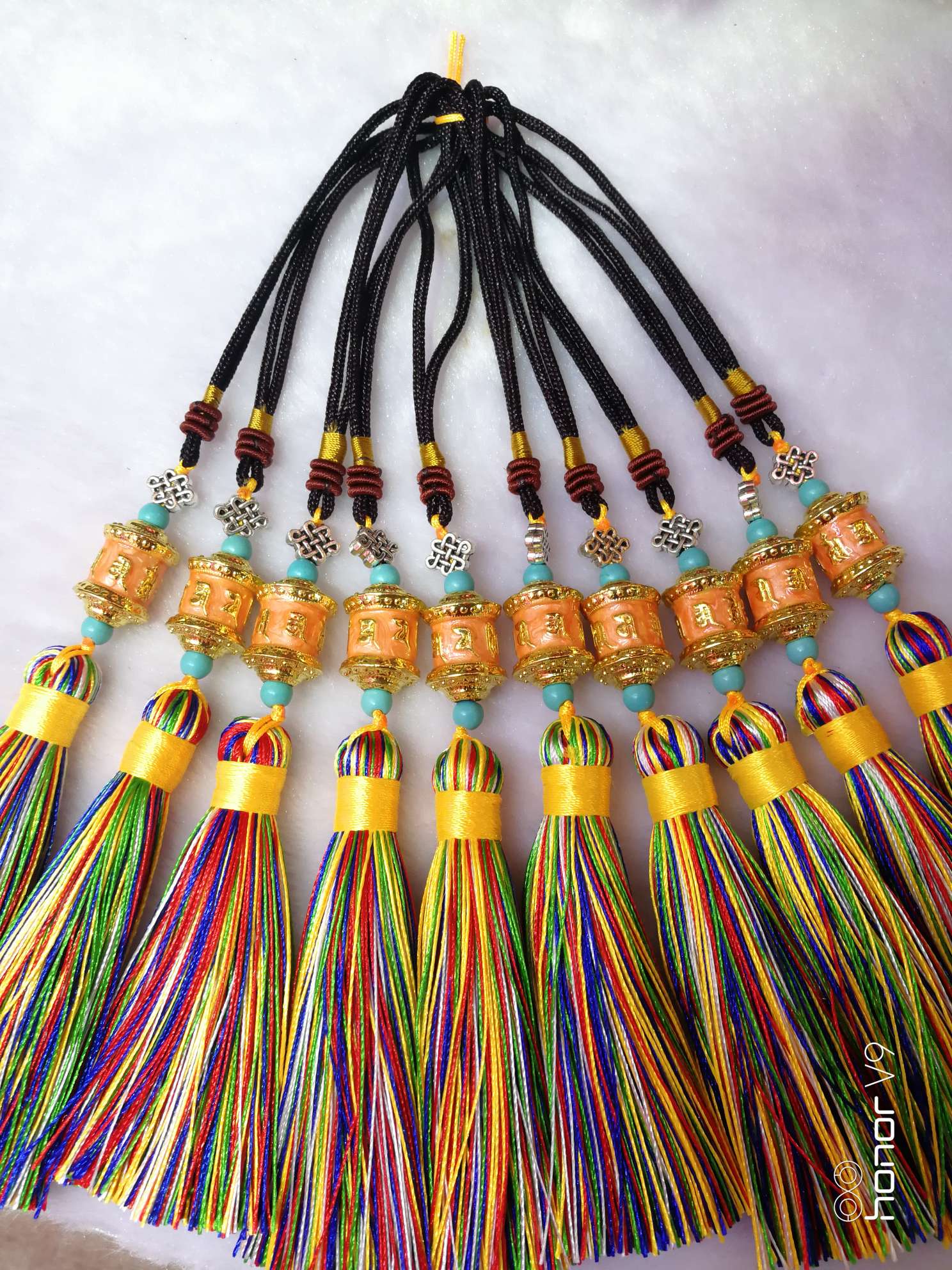 Turn the gold cylinder pendant undefined