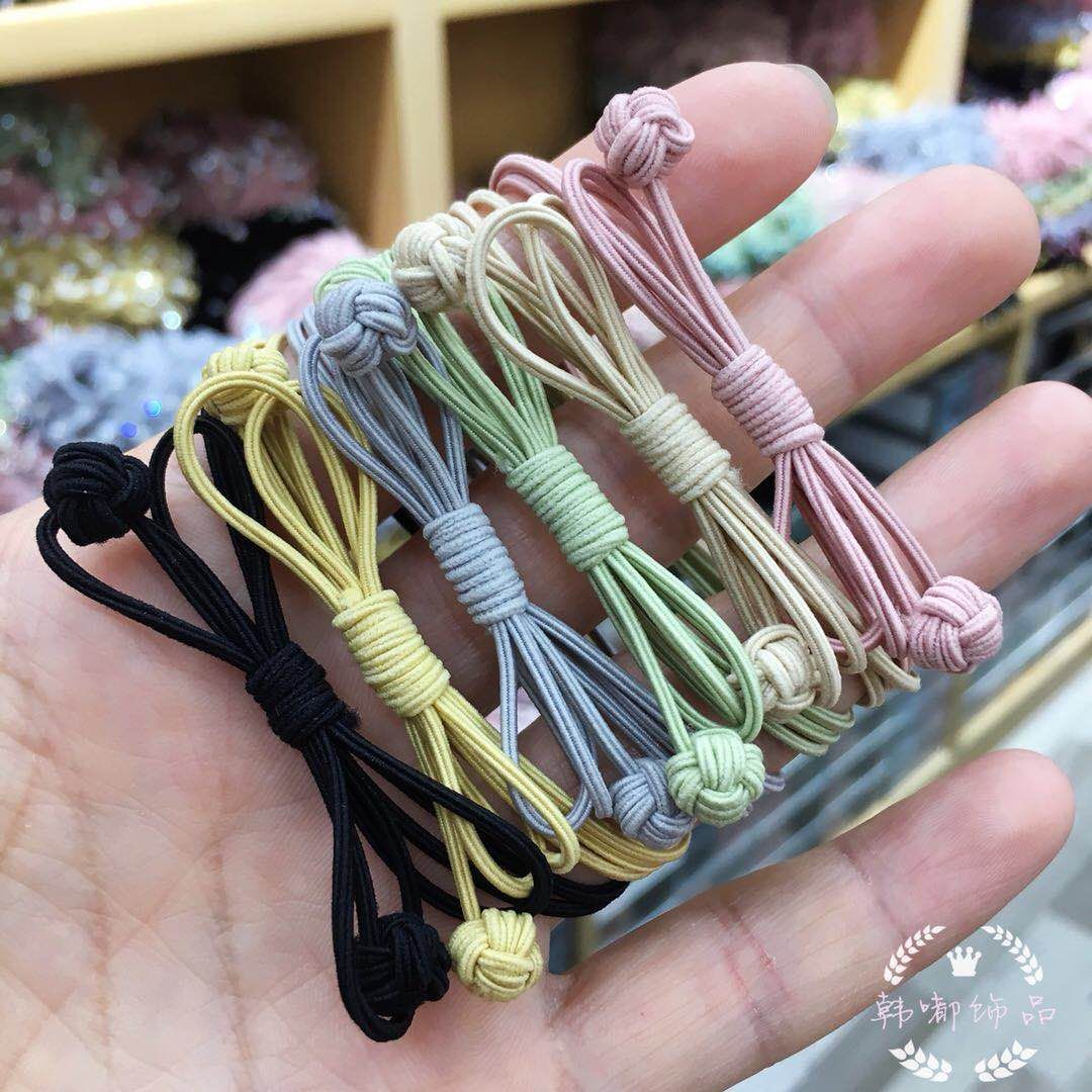 Four-corner double ball rubber band hair tie