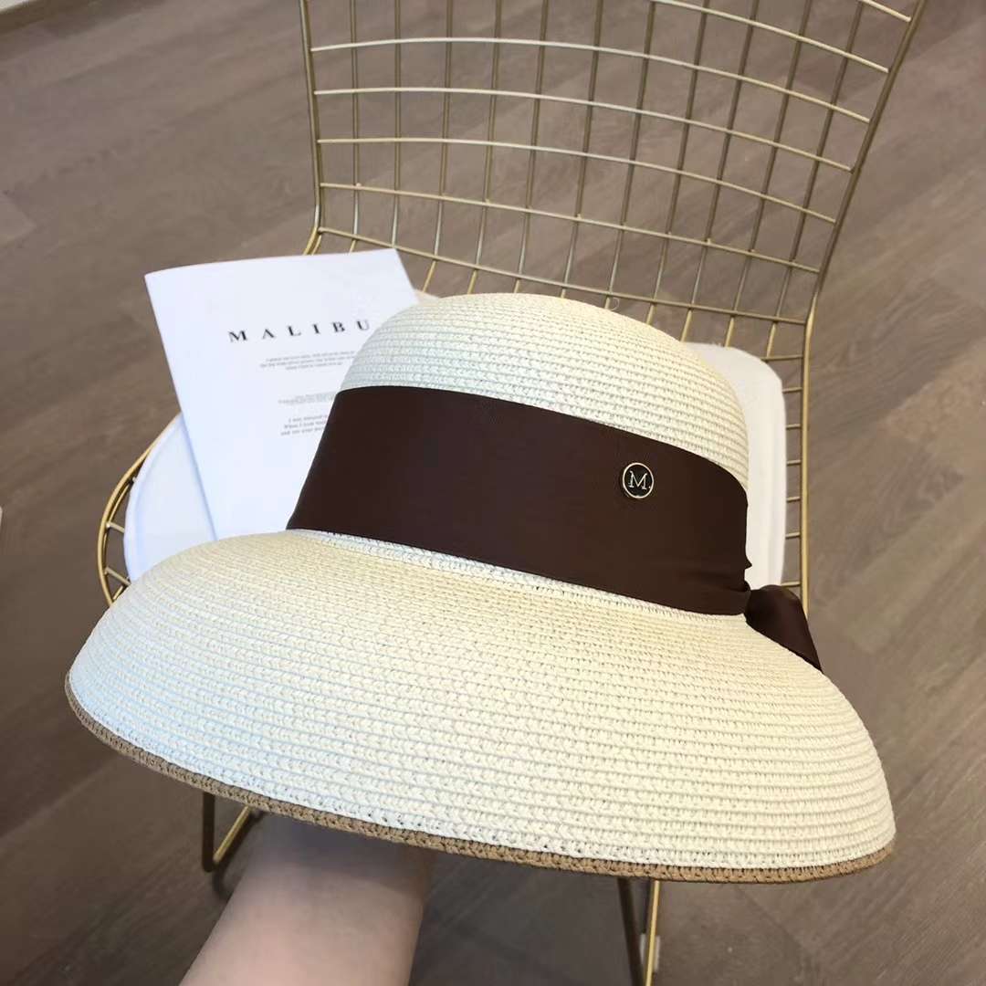 A chanel-style straw hat undefined