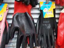 Black nitrile gloves black yarn black red yarn black