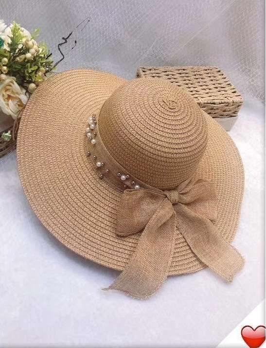 Order a bonnet with large pearl brim and ribbon